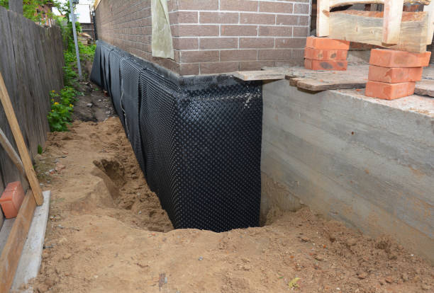 Happy homeowners after waterproofing job in Monmouth Junction